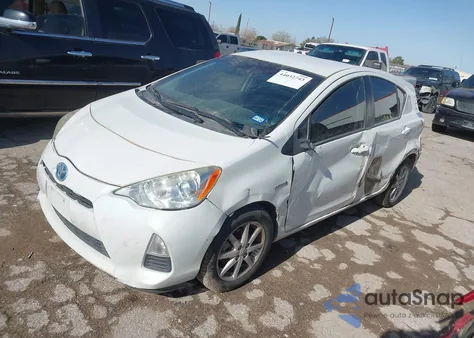 2014 Toyota Prius C Three from USA, damaged, VIN JTDKDTB34E1566041